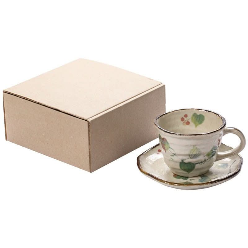 Japan Imported Mino-Yaki ceramic grape vine coffee set cup & saucer, beige with green leaves.